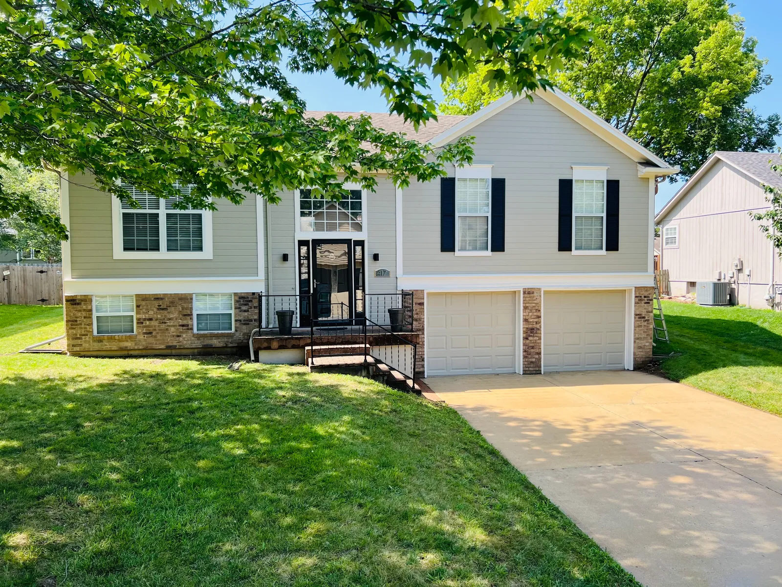 Split level cream colored home