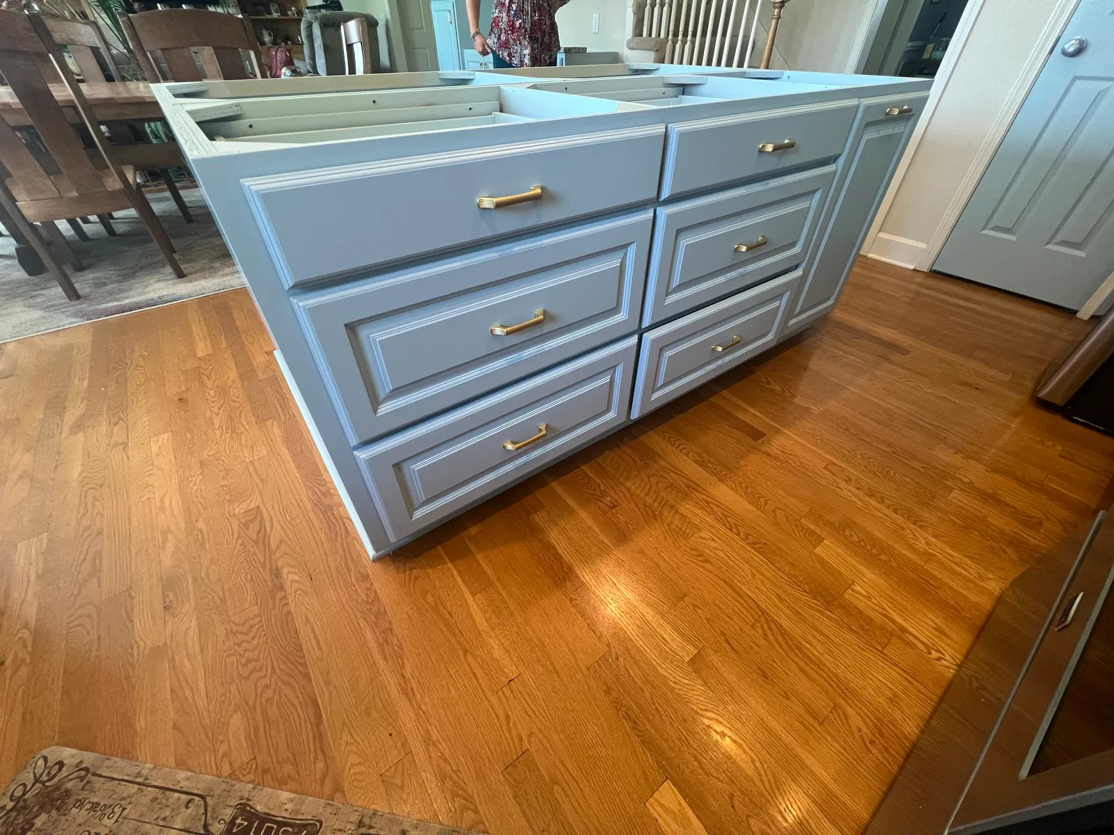 Kitchen island detail with brass hardware